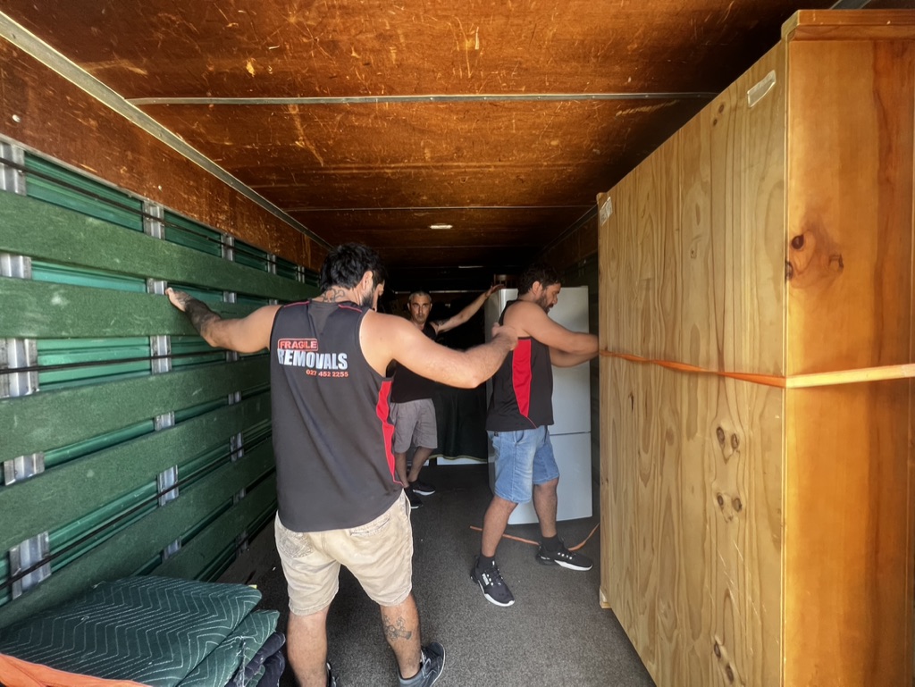 Waikato movers truck outside a house in Hamilton
